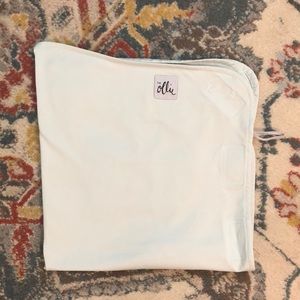 Ollie swaddle in sky